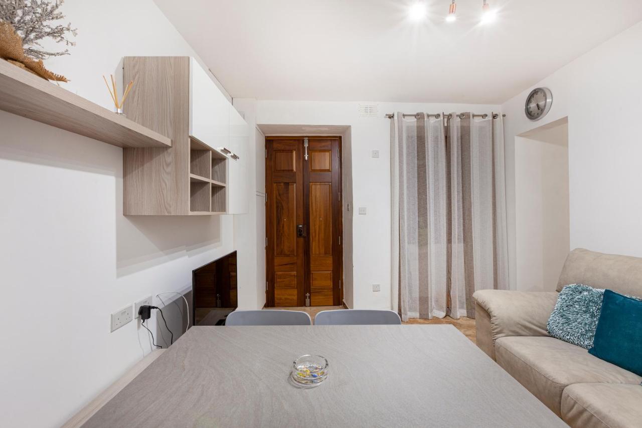 Designer With Comfy Sofa In By 360 Estates Apartment